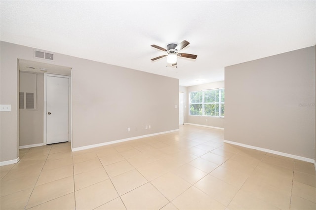 5140 Conroy Rd Unit 16, Orlando, FL 32811 - spare room featuring ceiling fan and light tile patterned floors