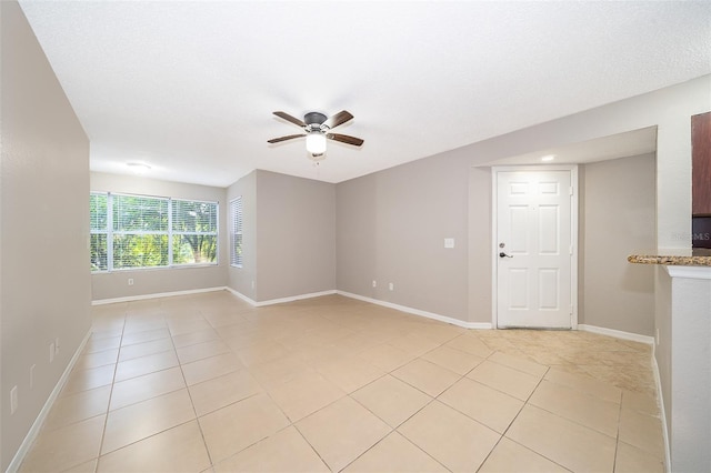 5140 Conroy Rd Unit 16, Orlando, FL 32811 - spare room featuring ceiling fan and light tile patterned flooring