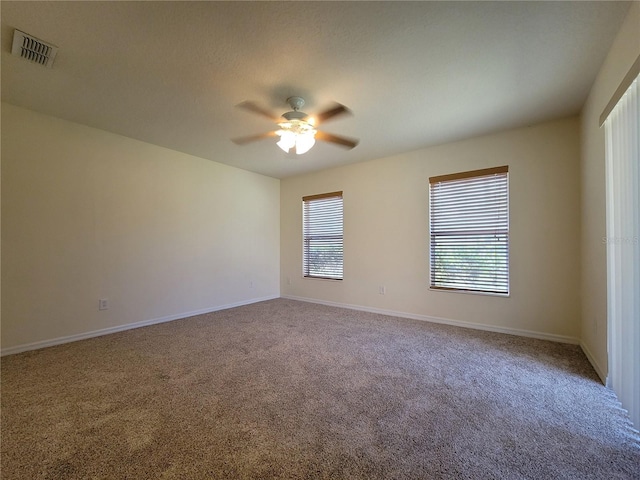 1914 Commander Way, Kissimmee, FL 34746 - spare room featuring carpet and a ceiling fan