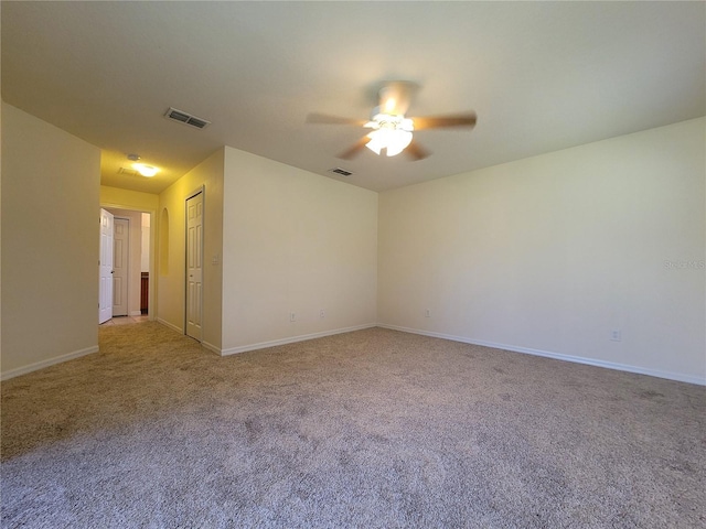 1914 Commander Way, Kissimmee, FL 34746 - carpeted spare room featuring a ceiling fan and baseboards
