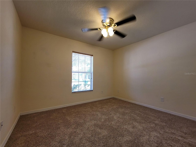1914 Commander Way, Kissimmee, FL 34746 - empty room with carpet floors, a ceiling fan, and a textured ceiling