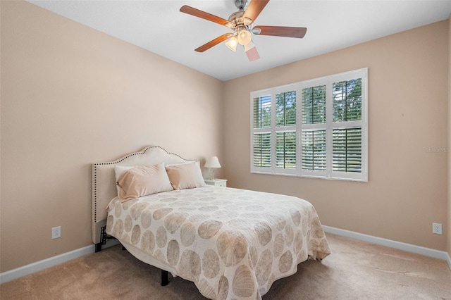 3685 Corsica Ln, Clermont, FL 34711 - carpeted bedroom featuring baseboards and a ceiling fan