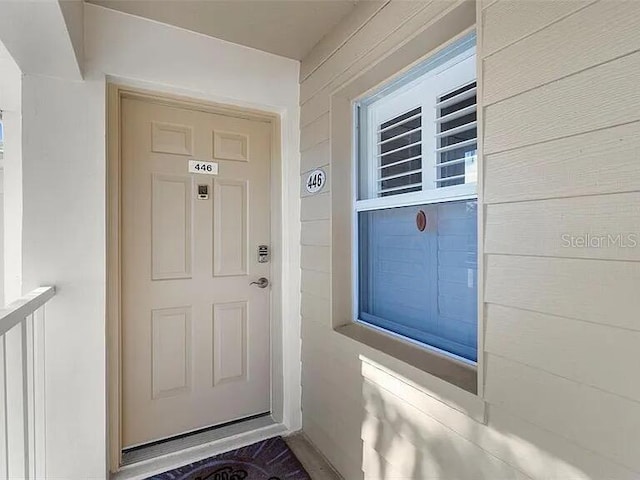 431 Cerromar Ln Unit 446, Venice, FL 34293 - doorway to property featuring covered porch