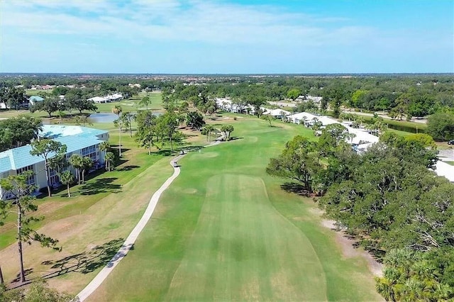 431 Cerromar Ln Unit 446, Venice, FL 34293 - bird's eye view of a golf course and a tree filled landscape