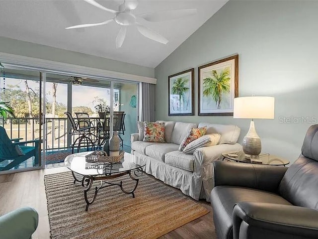 431 Cerromar Ln Unit 446, Venice, FL 34293 - living area with wood finished floors, lofted ceiling, and a ceiling fan