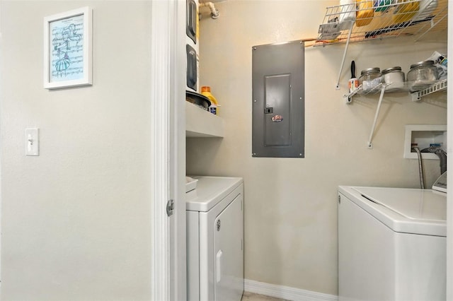 2025 Erving Cir Unit 203, Ocoee, FL 34761 - laundry area with electric panel and independent washer and dryer