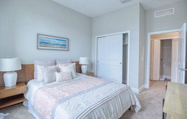 2113 Broome St, Kissimmee, FL 34743 - bedroom featuring light colored carpet and a closet