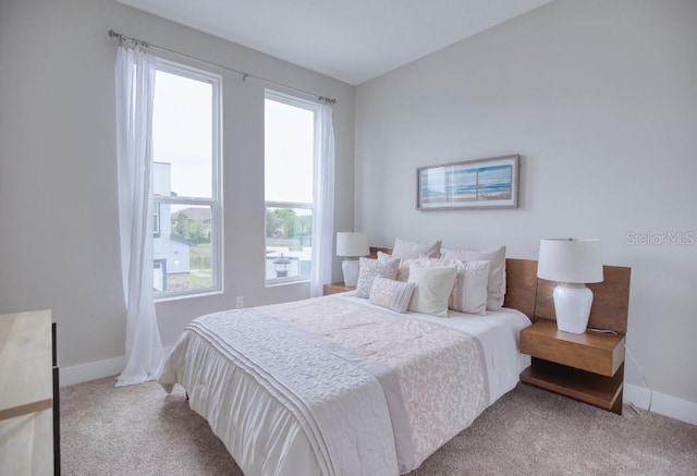 2113 Broome St, Kissimmee, FL 34743 - carpeted bedroom featuring baseboards