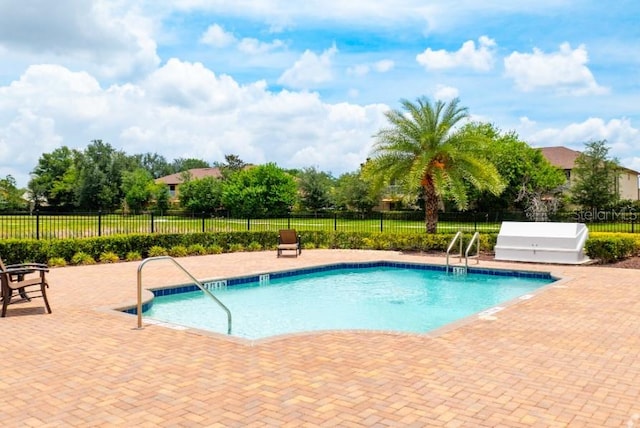 2113 Broome St, Kissimmee, FL 34743 - community pool featuring a patio area