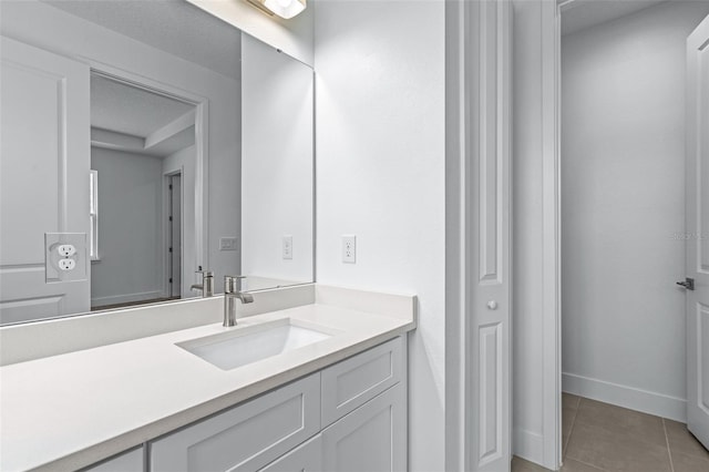 1261 Champions Dr, Daytona Beach, FL 32124 - bathroom featuring vanity and tile patterned flooring