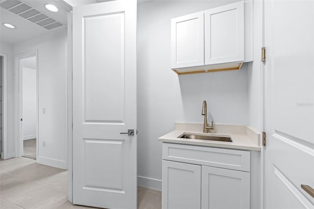 1261 Champions Dr, Daytona Beach, FL 32124 - laundry room featuring recessed lighting and light tile patterned floors