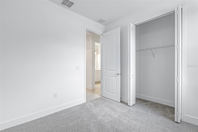1261 Champions Dr, Daytona Beach, FL 32124 - unfurnished bedroom with carpet floors and a closet