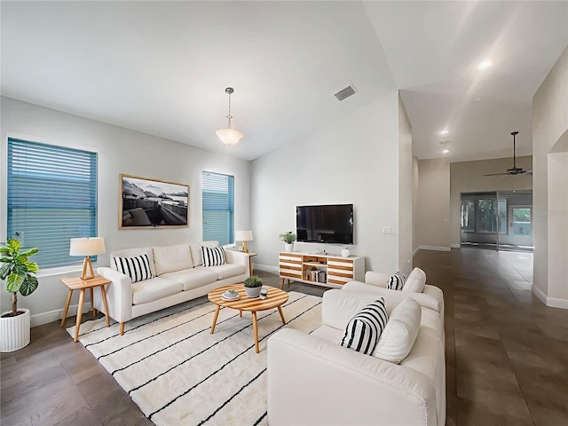 12671 Flatwood Creek Dr, Gibsonton, FL 33534 - living room with ceiling fan, healthy amount of natural light, and lofted ceiling