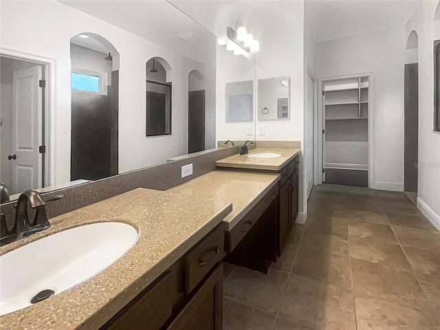 12671 Flatwood Creek Dr, Gibsonton, FL 33534 - bathroom featuring double vanity and tile patterned flooring