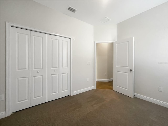 12671 Flatwood Creek Dr, Gibsonton, FL 33534 - unfurnished bedroom with carpet and a closet