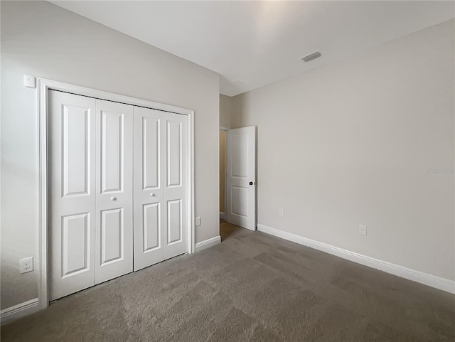 12671 Flatwood Creek Dr, Gibsonton, FL 33534 - unfurnished bedroom with carpet floors and a closet