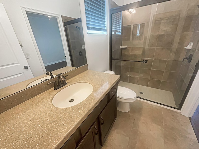 12671 Flatwood Creek Dr, Gibsonton, FL 33534 - full bathroom featuring a stall shower, vanity, and tile patterned floors