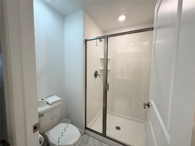 4192 Paragraph Dr, Kissimmee, FL 34746 - bathroom featuring a stall shower and a textured ceiling