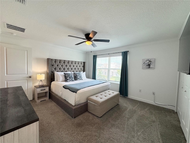 4192 Paragraph Dr, Kissimmee, FL 34746 - bedroom featuring crown molding, carpet floors, ceiling fan, and a textured ceiling