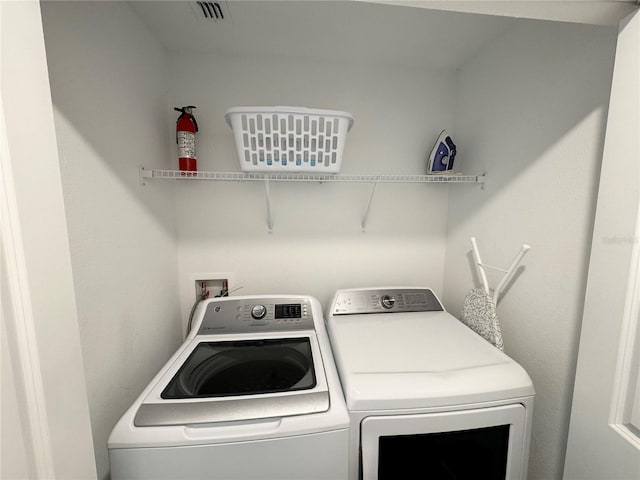 4192 Paragraph Dr, Kissimmee, FL 34746 - washroom with independent washer and dryer