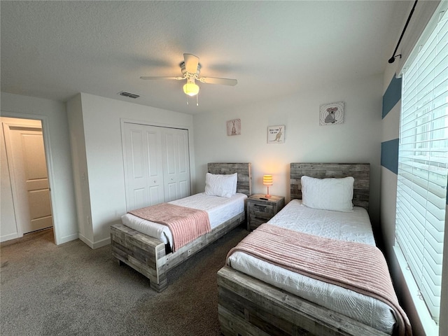 4192 Paragraph Dr, Kissimmee, FL 34746 - bedroom featuring carpet flooring, a closet, and a ceiling fan