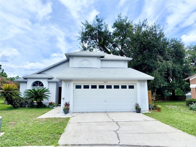 9803 Terrace Trail Ln, Temple Terrace, FL 33637 - traditional-style home featuring concrete driveway, a garage, and a front yard
