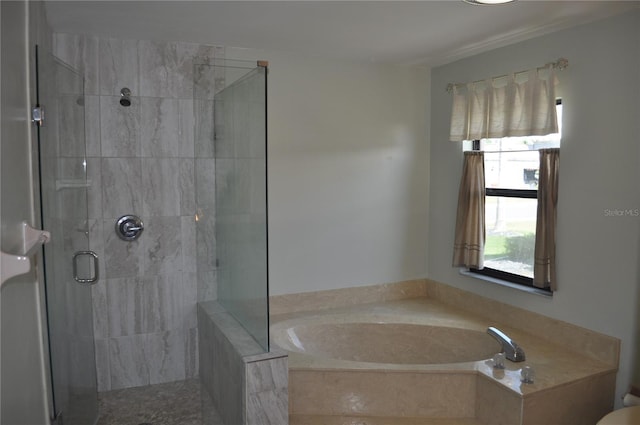 721 Elkhorn Rd, Sun City Center, FL 33573 - bathroom featuring a stall shower and a bath