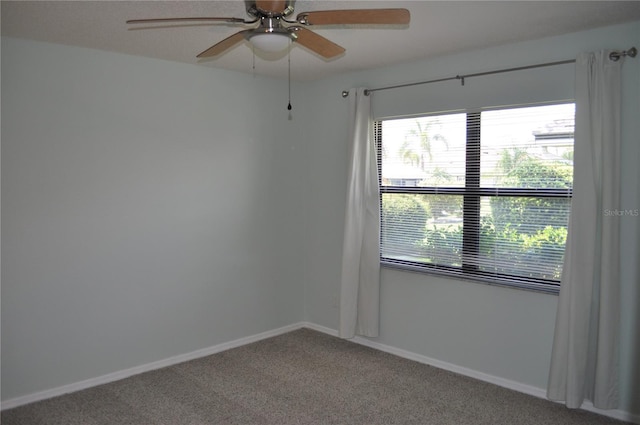 721 Elkhorn Rd, Sun City Center, FL 33573 - spare room featuring ceiling fan and carpet