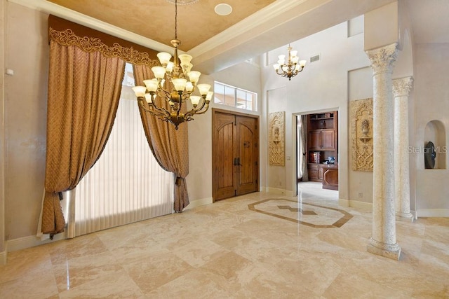11209 Macaw Ct, Windermere, FL 34786 - entryway featuring a chandelier, a high ceiling, marble finish flooring, and decorative columns