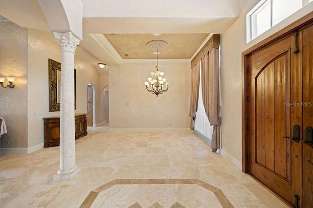 11209 Macaw Ct, Windermere, FL 34786 - foyer with arched walkways, ornate columns, and a chandelier
