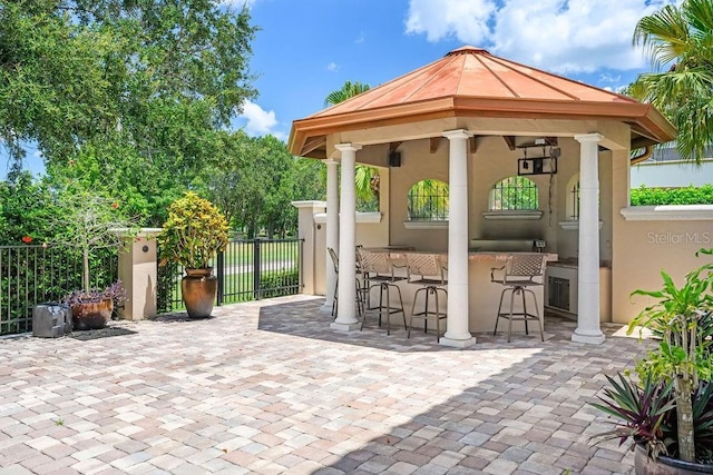 11209 Macaw Ct, Windermere, FL 34786 - view of patio / terrace featuring a gazebo