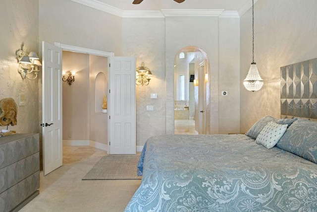 11209 Macaw Ct, Windermere, FL 34786 - carpeted bedroom featuring arched walkways, crown molding, and ensuite bath