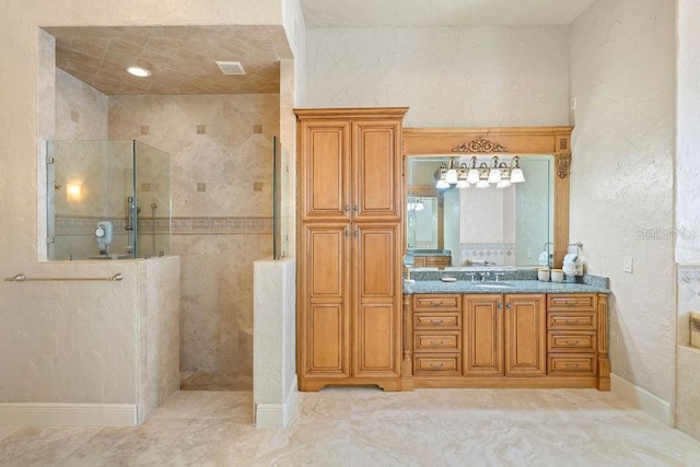 11209 Macaw Ct, Windermere, FL 34786 - bathroom featuring vanity, a walk in shower, and a textured wall