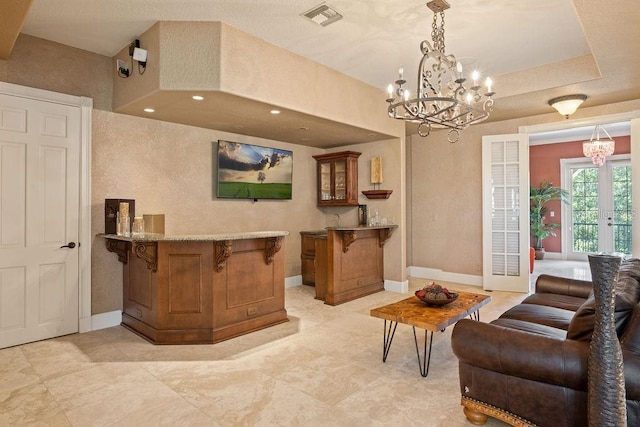 11209 Macaw Ct, Windermere, FL 34786 - bar featuring a chandelier, hanging light fixtures, and recessed lighting