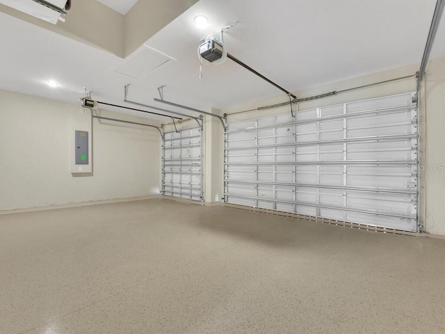 10381 Rainsville St, Port Charlotte, FL 33981 - garage featuring a garage door opener and electric panel