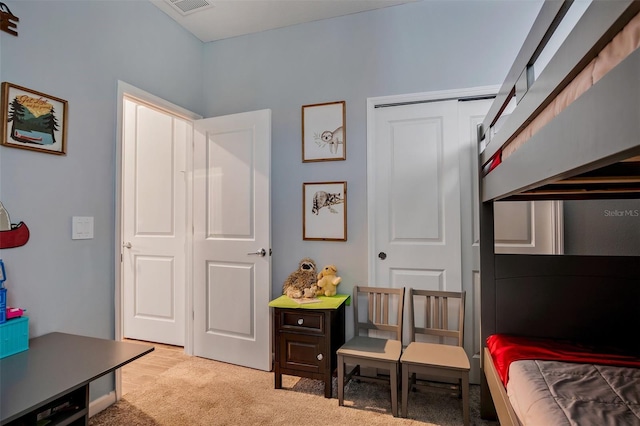 6992 Dilly Lake Ave, Groveland, FL 34736 - bedroom featuring light colored carpet and a closet
