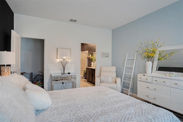 6992 Dilly Lake Ave, Groveland, FL 34736 - bedroom with ensuite bathroom and baseboards