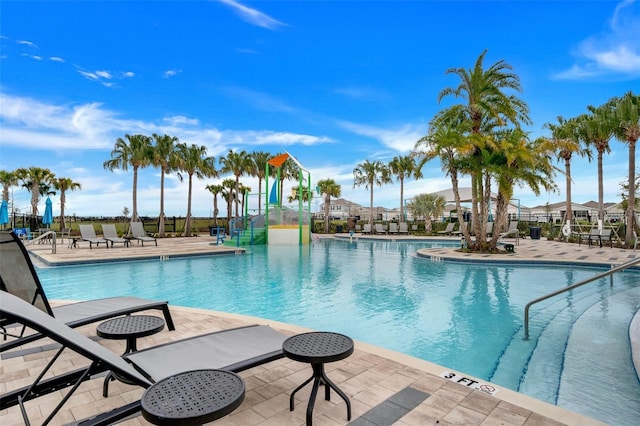 6992 Dilly Lake Ave, Groveland, FL 34736 - community pool with a patio