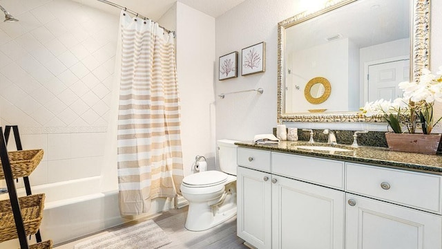 7650 Whisper Way Unit 304, Reunion, FL 34747 - bathroom featuring vanity, wood finished floors, and shower / bathtub combination with curtain