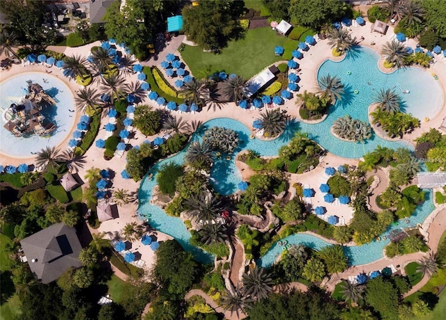 7650 Whisper Way Unit 304, Reunion, FL 34747 - drone / aerial view of a pool area