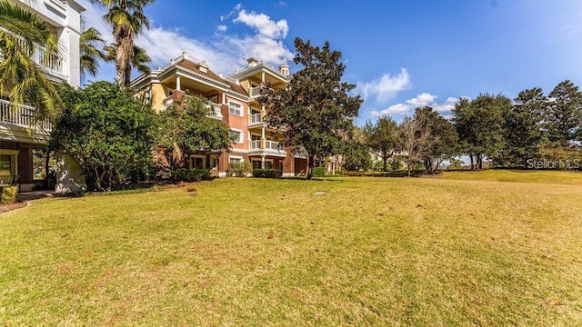 7650 Whisper Way Unit 304, Reunion, FL 34747 - view of green lawn