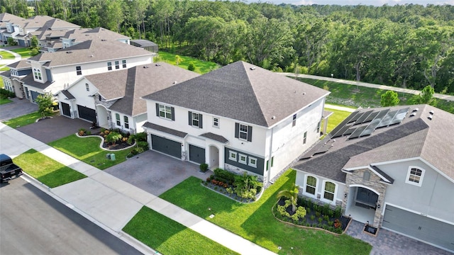 4477 Renly Ln, Clermont, FL 34711 - aerial perspective of suburban area with a heavily wooded area