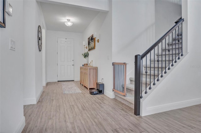 4477 Renly Ln, Clermont, FL 34711 - entryway featuring wood finished floors and stairs
