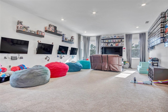 4477 Renly Ln, Clermont, FL 34711 - carpeted living area featuring recessed lighting