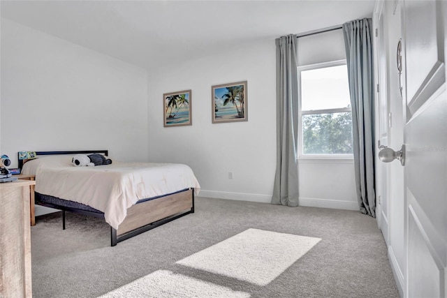 4477 Renly Ln, Clermont, FL 34711 - carpeted bedroom with baseboards