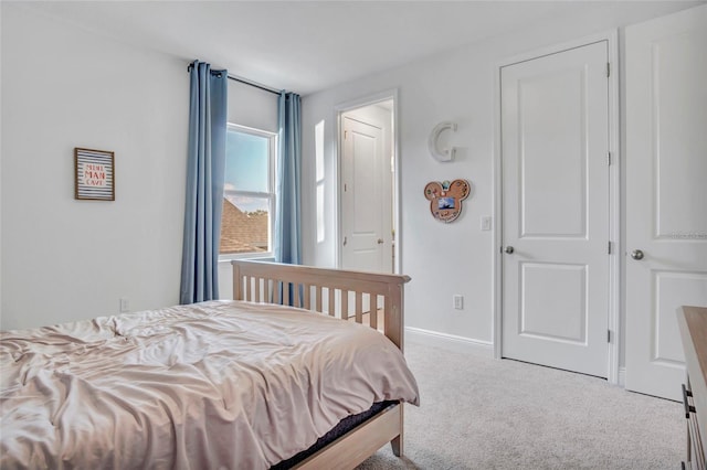 4477 Renly Ln, Clermont, FL 34711 - carpeted bedroom with baseboards