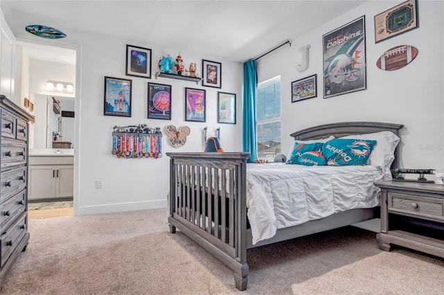 4477 Renly Ln, Clermont, FL 34711 - bedroom with light colored carpet and ensuite bathroom