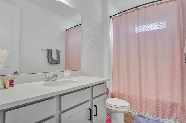 4477 Renly Ln, Clermont, FL 34711 - bathroom featuring vanity, wood finished floors, and a shower with curtain