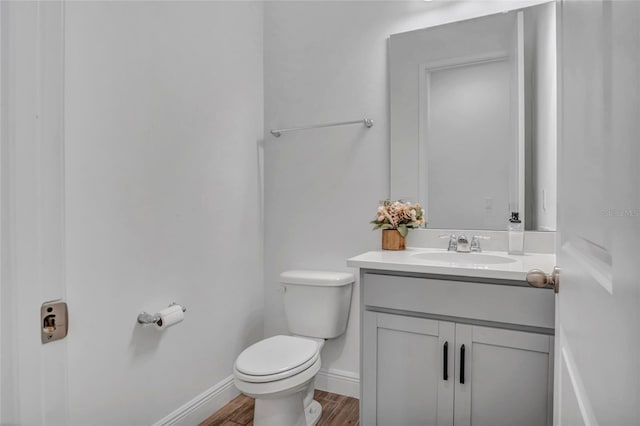 4477 Renly Ln, Clermont, FL 34711 - bathroom with vanity and wood finished floors