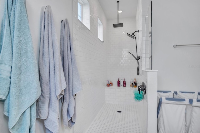 4477 Renly Ln, Clermont, FL 34711 - bathroom featuring a tile shower